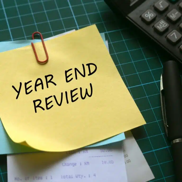 post-it note with "Year End Review" text